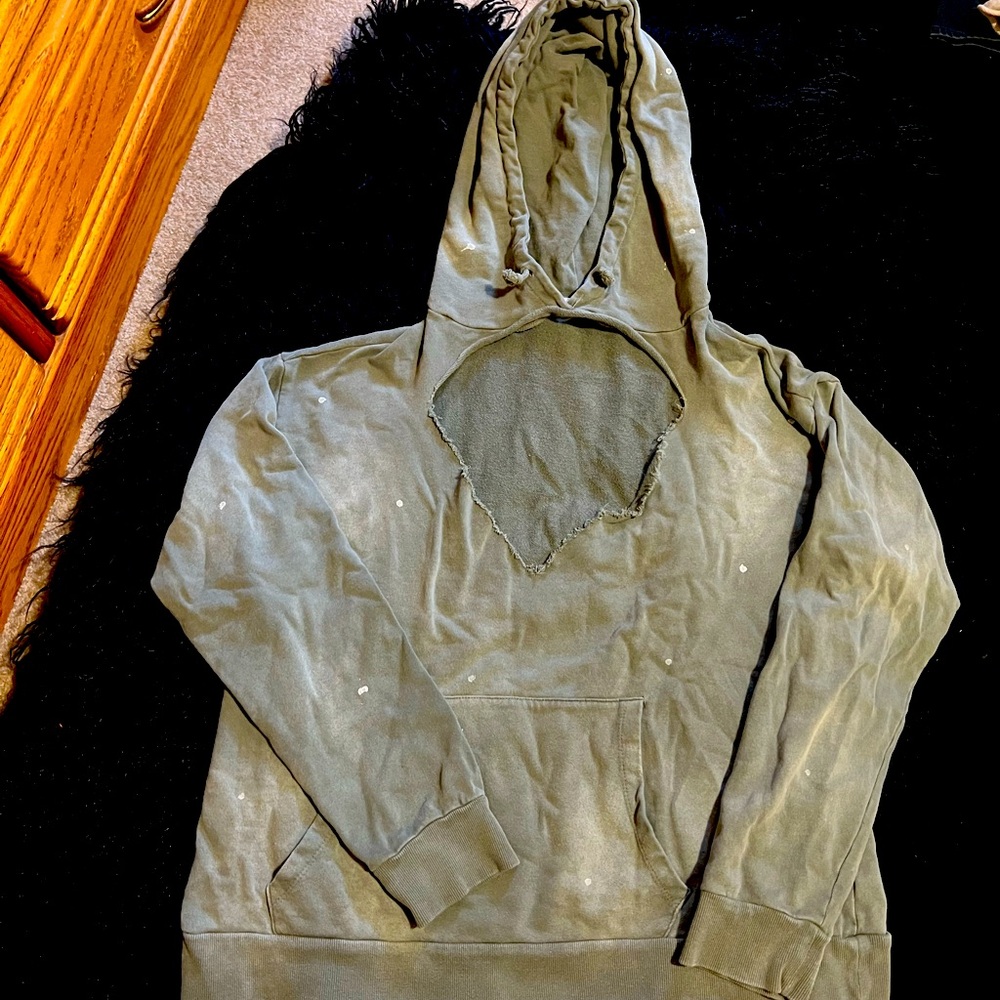 Distressed green with white little paint like marks; over sized sweatshirt